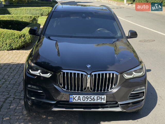 Черный БМВ Х5, объемом двигателя 3 л и пробегом 71 тыс. км за 50000 $, фото 1 на Automoto.ua