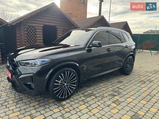 Черный БМВ Х5, объемом двигателя 3 л и пробегом 74 тыс. км за 56000 $, фото 4 на Automoto.ua