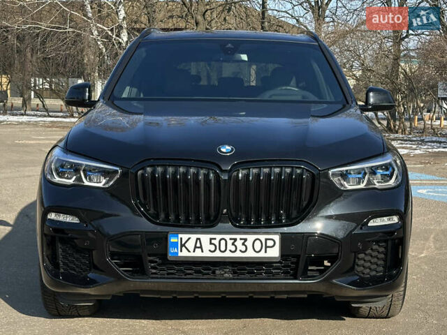 Черный БМВ Х5, объемом двигателя 3 л и пробегом 54 тыс. км за 63050 $, фото 1 на Automoto.ua