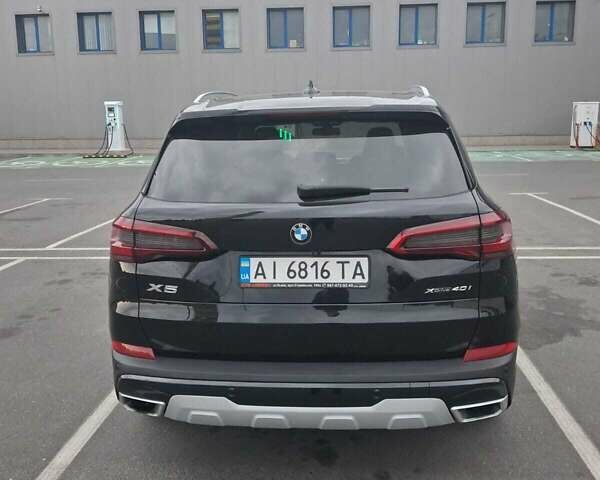 Черный БМВ Х5, объемом двигателя 3 л и пробегом 174 тыс. км за 47500 $, фото 3 на Automoto.ua
