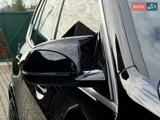 Черный БМВ Х5, объемом двигателя 3 л и пробегом 74 тыс. км за 56000 $, фото 18 на Automoto.ua