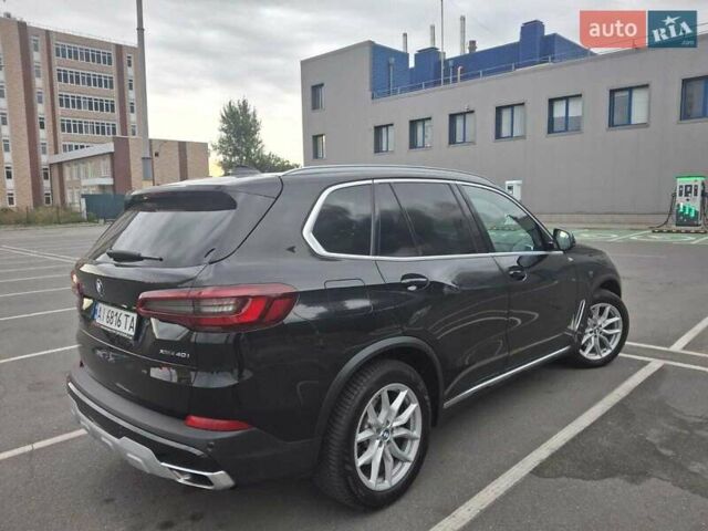 Черный БМВ Х5, объемом двигателя 3 л и пробегом 174 тыс. км за 47500 $, фото 6 на Automoto.ua