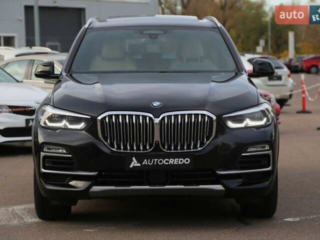 Черный БМВ Х5, объемом двигателя 3 л и пробегом 174 тыс. км за 49500 $, фото 1 на Automoto.ua