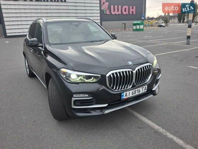 Черный БМВ Х5, объемом двигателя 3 л и пробегом 174 тыс. км за 47500 $, фото 7 на Automoto.ua