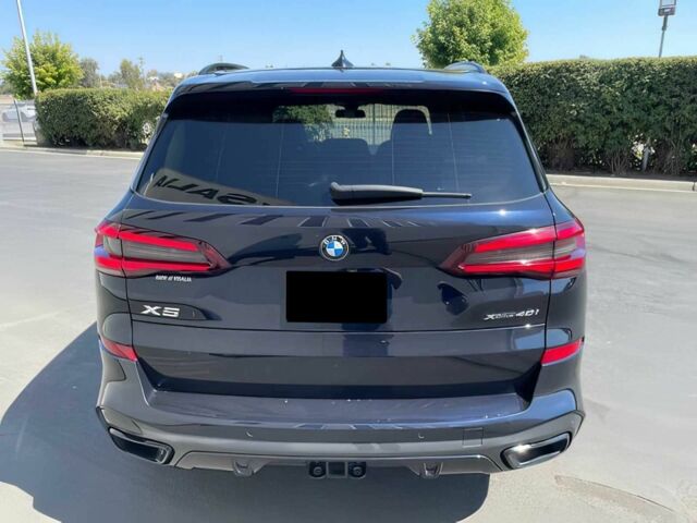 Чорний БМВ Х5, об'ємом двигуна 3 л та пробігом 34 тис. км за 25000 $, фото 3 на Automoto.ua