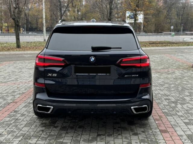 Черный БМВ Х5, объемом двигателя 3 л и пробегом 64 тыс. км за 81900 $, фото 2 на Automoto.ua