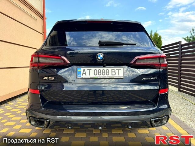 Черный БМВ Х5, объемом двигателя 3 л и пробегом 57 тыс. км за 75000 $, фото 1 на Automoto.ua