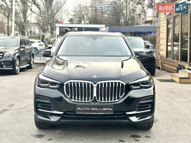 Черный БМВ Х5, объемом двигателя 2 л и пробегом 52 тыс. км за 58999 $, фото 1 на Automoto.ua