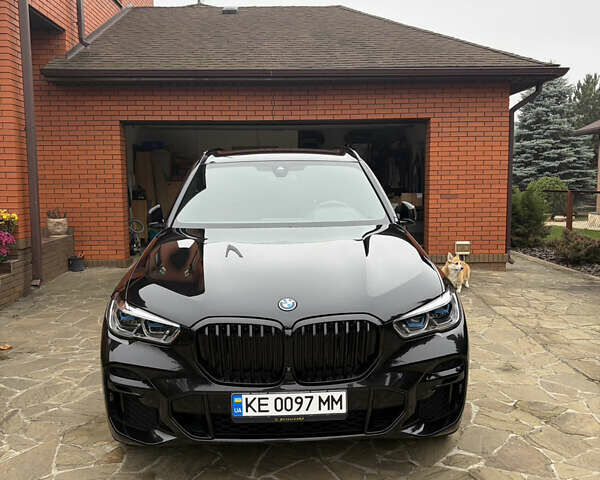 Чорний БМВ Х5, об'ємом двигуна 3 л та пробігом 100 тис. км за 75000 $, фото 2 на Automoto.ua