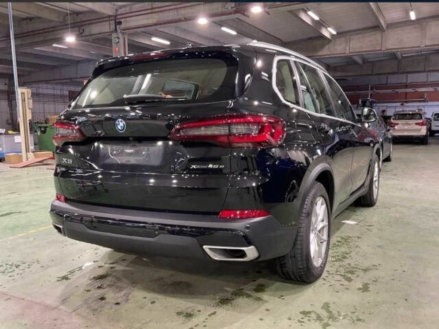 Черный БМВ Х5, объемом двигателя 3 л и пробегом 55 тыс. км за 28325 $, фото 1 на Automoto.ua
