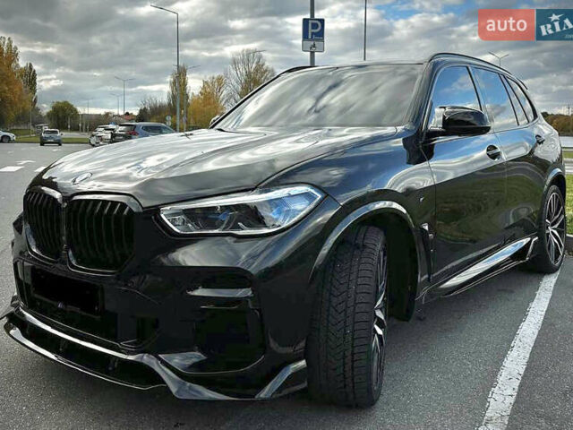 Черный БМВ Х5, объемом двигателя 3 л и пробегом 66 тыс. км за 64900 $, фото 1 на Automoto.ua