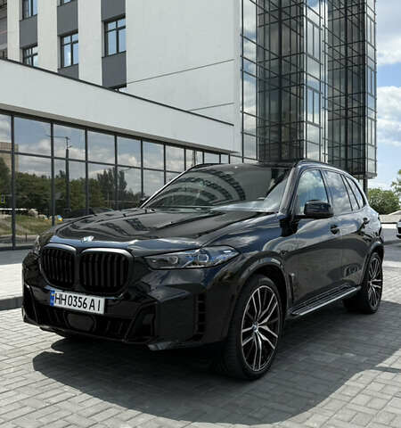 Черный БМВ Х5, объемом двигателя 3 л и пробегом 20 тыс. км за 80500 $, фото 1 на Automoto.ua