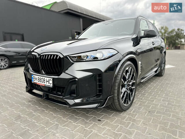 Черный БМВ Х5, объемом двигателя 3 л и пробегом 13 тыс. км за 78000 $, фото 1 на Automoto.ua