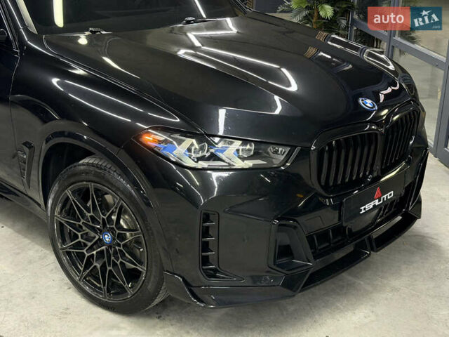 Черный БМВ Х5, объемом двигателя 3 л и пробегом 35 тыс. км за 72000 $, фото 2 на Automoto.ua