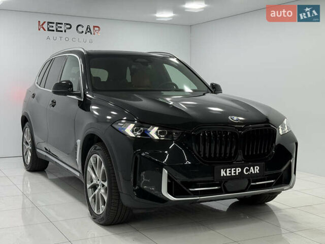 Черный БМВ Х5, объемом двигателя 3 л и пробегом 22 тыс. км за 87900 $, фото 2 на Automoto.ua