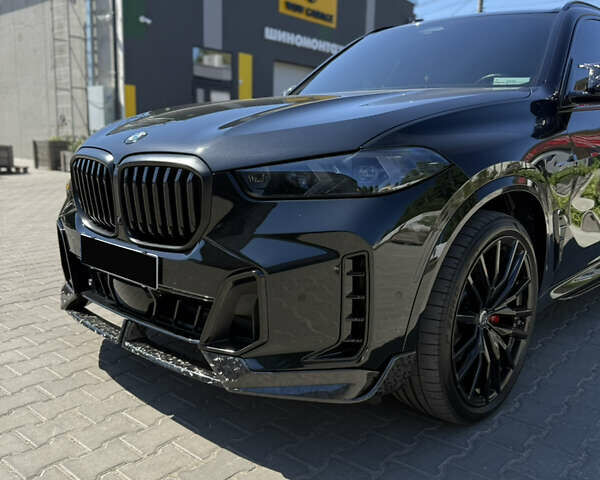 Черный БМВ Х5, объемом двигателя 3 л и пробегом 30 тыс. км за 87999 $, фото 1 на Automoto.ua