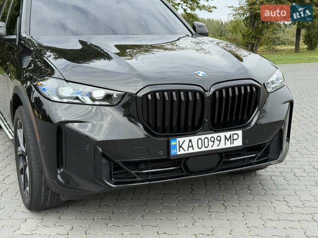 Черный БМВ Х5, объемом двигателя 3 л и пробегом 75 тыс. км за 72800 $, фото 20 на Automoto.ua