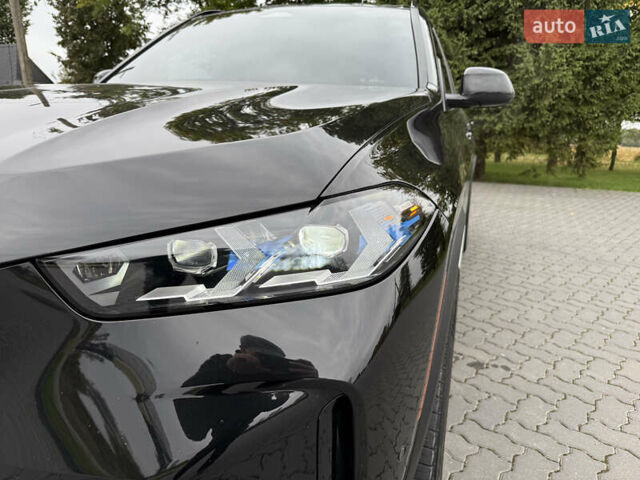 Черный БМВ Х5, объемом двигателя 3 л и пробегом 75 тыс. км за 72800 $, фото 3 на Automoto.ua