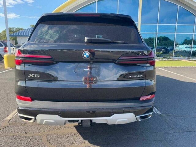 Черный БМВ Х5, объемом двигателя 3 л и пробегом 38 тыс. км за 40000 $, фото 2 на Automoto.ua