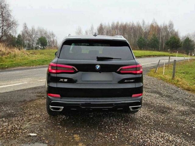 Черный БМВ Х5, объемом двигателя 3 л и пробегом 49 тыс. км за 33300 $, фото 3 на Automoto.ua