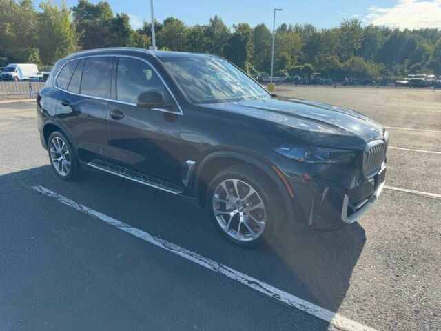 Черный БМВ Х5, объемом двигателя 3 л и пробегом 38 тыс. км за 40000 $, фото 4 на Automoto.ua