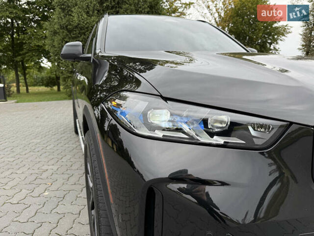 Черный БМВ Х5, объемом двигателя 3 л и пробегом 75 тыс. км за 72800 $, фото 4 на Automoto.ua