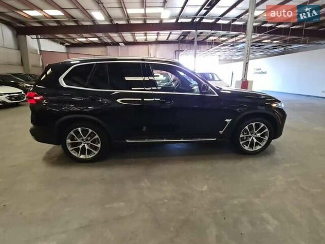 Черный БМВ Х5, объемом двигателя 3 л и пробегом 50 тыс. км за 42000 $, фото 1 на Automoto.ua