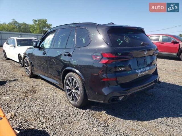 Черный БМВ Х5, объемом двигателя 3 л и пробегом 10 тыс. км за 82500 $, фото 1 на Automoto.ua
