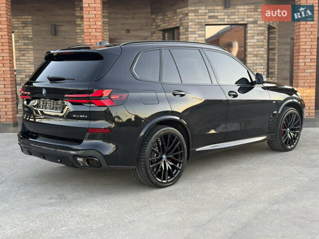 Черный БМВ Х5, объемом двигателя 3 л и пробегом 18 тыс. км за 155000 $, фото 5 на Automoto.ua