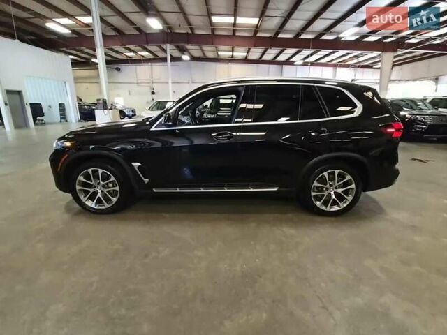 Черный БМВ Х5, объемом двигателя 3 л и пробегом 50 тыс. км за 42000 $, фото 2 на Automoto.ua