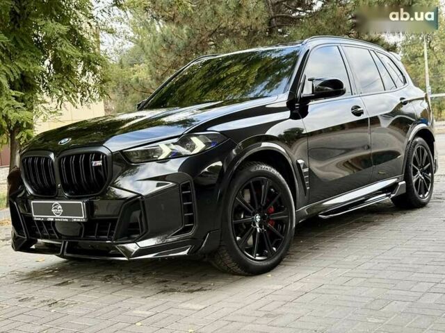 Черный БМВ Х5, объемом двигателя 4.4 л и пробегом 34 тыс. км за 129999 $, фото 1 на Automoto.ua