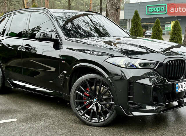 Черный БМВ Х5, объемом двигателя 2.99 л и пробегом 33 тыс. км за 133000 $, фото 2 на Automoto.ua