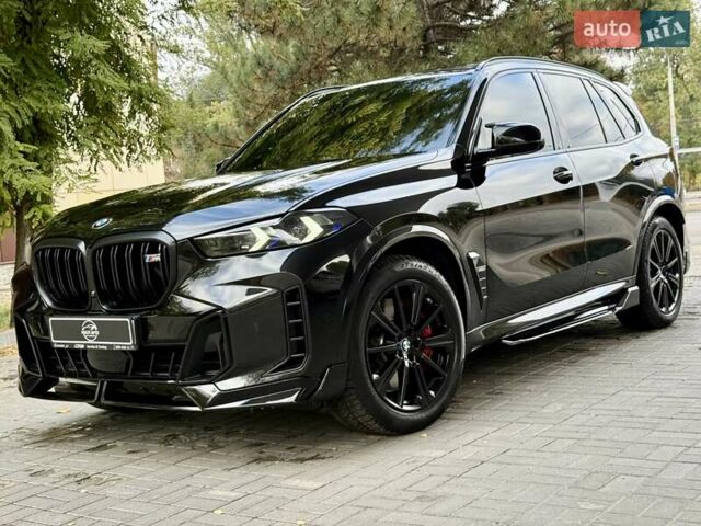 Чорний БМВ Х5, об'ємом двигуна 3 л та пробігом 34 тис. км за 129000 $, фото 1 на Automoto.ua