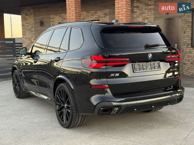 Черный БМВ Х5, объемом двигателя 3 л и пробегом 18 тыс. км за 155000 $, фото 4 на Automoto.ua