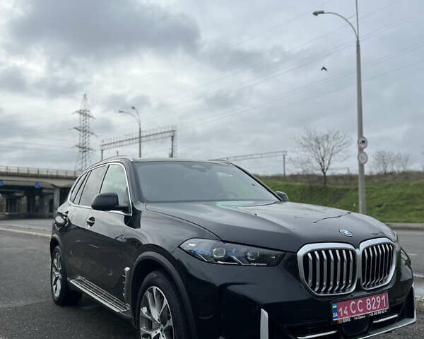 Черный БМВ Х5, объемом двигателя 3 л и пробегом 41 тыс. км за 92500 $, фото 1 на Automoto.ua