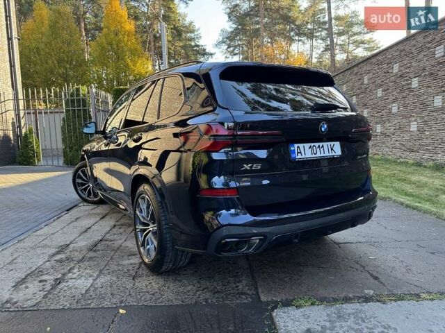 Черный БМВ Х5, объемом двигателя 3 л и пробегом 13 тыс. км за 109000 $, фото 4 на Automoto.ua