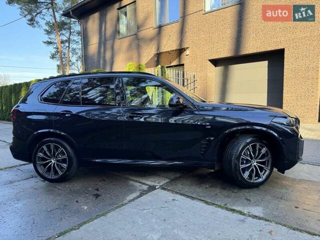 Черный БМВ Х5, объемом двигателя 3 л и пробегом 13 тыс. км за 109000 $, фото 1 на Automoto.ua