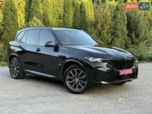Черный БМВ Х5, объемом двигателя 3 л и пробегом 2 тыс. км за 83000 $, фото 1 на Automoto.ua