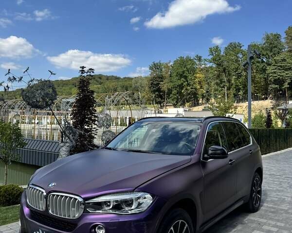 Фиолетовый БМВ Х5, объемом двигателя 2.99 л и пробегом 102 тыс. км за 40000 $, фото 1 на Automoto.ua