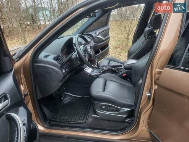 Коричневий БМВ Х5, об'ємом двигуна 2.98 л та пробігом 325 тис. км за 9200 $, фото 78 на Automoto.ua