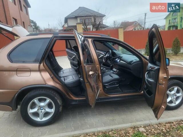 Коричневий БМВ Х5, об'ємом двигуна 2.98 л та пробігом 325 тис. км за 9200 $, фото 76 на Automoto.ua