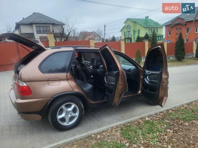 Коричневий БМВ Х5, об'ємом двигуна 2.98 л та пробігом 325 тис. км за 9200 $, фото 75 на Automoto.ua