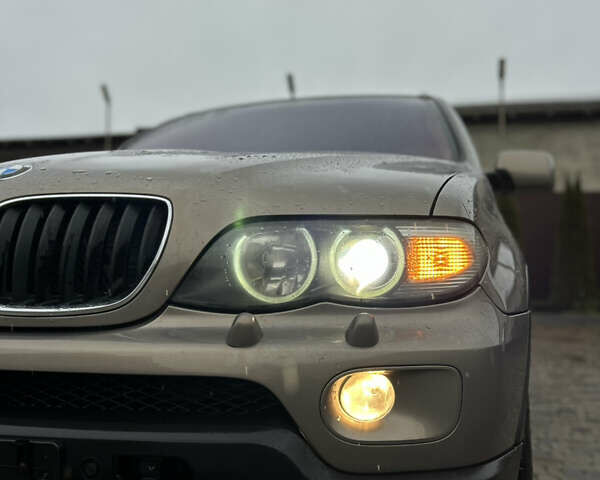 Коричневый БМВ Х5, объемом двигателя 3 л и пробегом 318 тыс. км за 9850 $, фото 4 на Automoto.ua