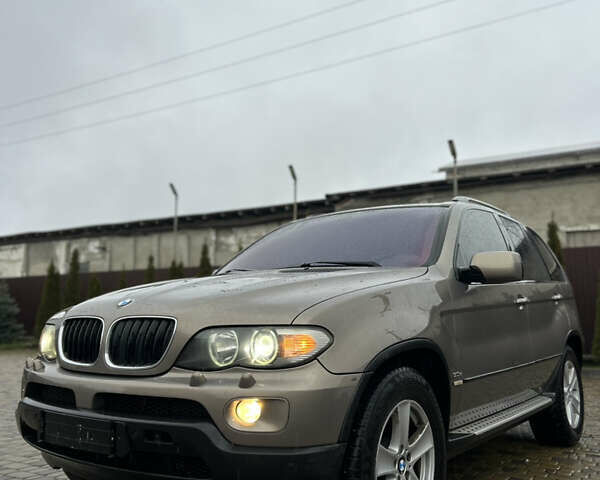 Коричневый БМВ Х5, объемом двигателя 3 л и пробегом 318 тыс. км за 9850 $, фото 6 на Automoto.ua