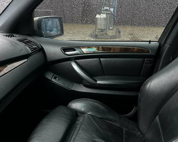 Коричневый БМВ Х5, объемом двигателя 3 л и пробегом 318 тыс. км за 9850 $, фото 24 на Automoto.ua