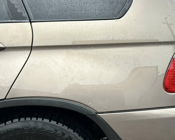 Коричневый БМВ Х5, объемом двигателя 3 л и пробегом 318 тыс. км за 9850 $, фото 22 на Automoto.ua