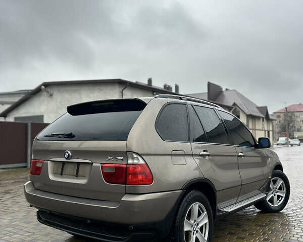 Коричневый БМВ Х5, объемом двигателя 3 л и пробегом 318 тыс. км за 9850 $, фото 2 на Automoto.ua