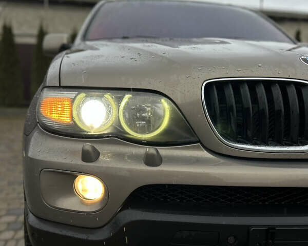 Коричневый БМВ Х5, объемом двигателя 3 л и пробегом 318 тыс. км за 9850 $, фото 3 на Automoto.ua