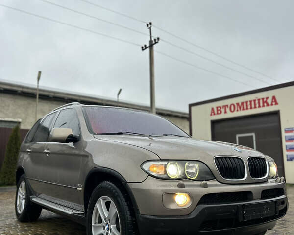 Коричневый БМВ Х5, объемом двигателя 3 л и пробегом 318 тыс. км за 9850 $, фото 7 на Automoto.ua