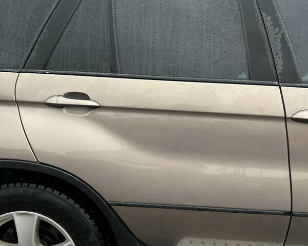 Коричневый БМВ Х5, объемом двигателя 3 л и пробегом 318 тыс. км за 9850 $, фото 16 на Automoto.ua